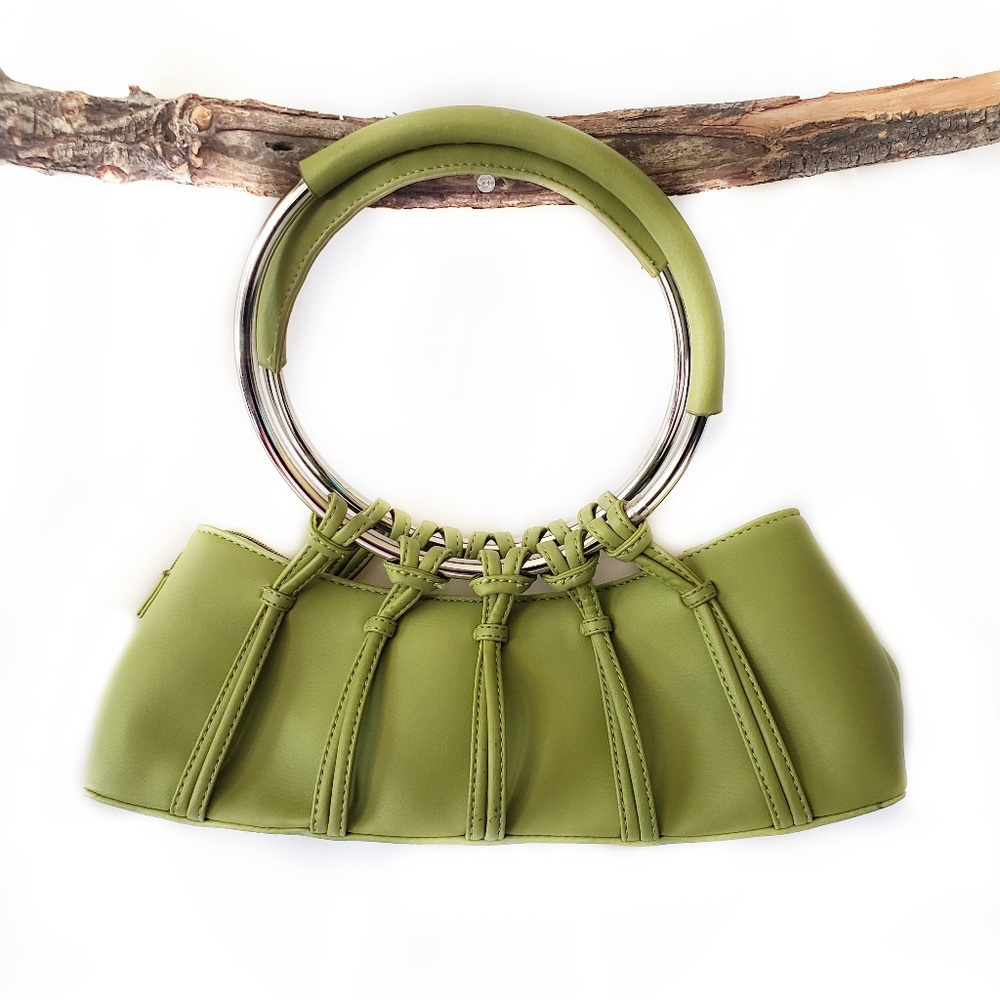 Vintage handbag with large metal handles